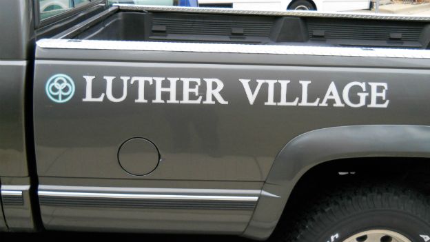 Luther Village.  Line your pick-up truck bed with graphics to get attention. 